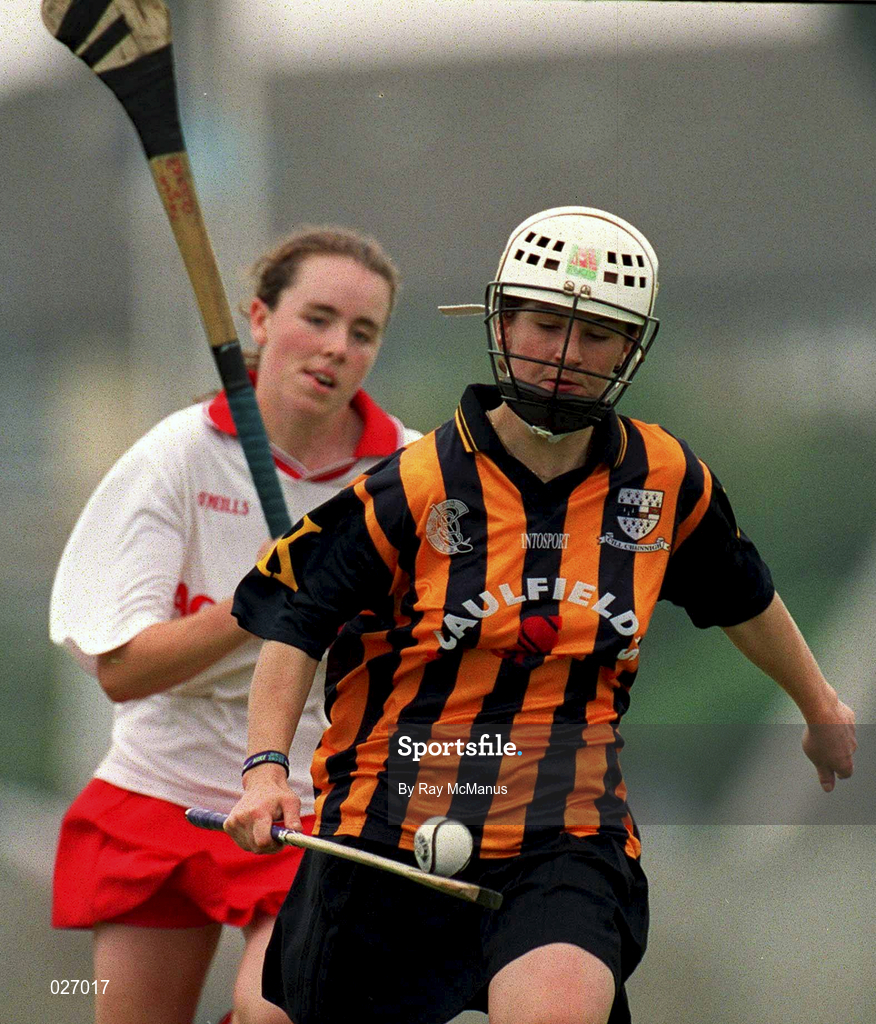 7 August 1999; Lizzie Lyng of kilkenny in action against Paula O'Connor of Cork during the Bórd na Gaeilge All Ireland Senior Camogie Championship Semi-Final match between Cork and Kilkenny at Parnell Park in Dublin. Photo by Ray McManus/Sportsfile