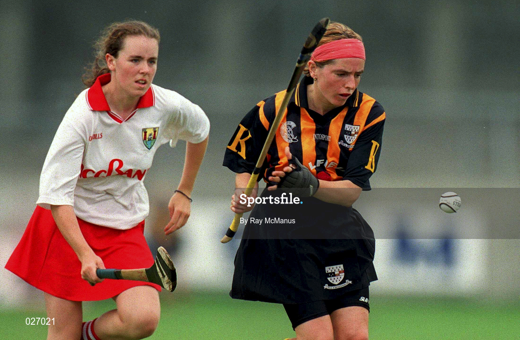 7 August 1999; Marina Downey of Kilkenny in action against Paula O'Connor of Cork during the Bórd na Gaeilge All Ireland Senior Camogie Championship Semi-Final match between Cork and Kilkenny at Parnell Park in Dublin. Photo by Ray McManus/Sportsfile