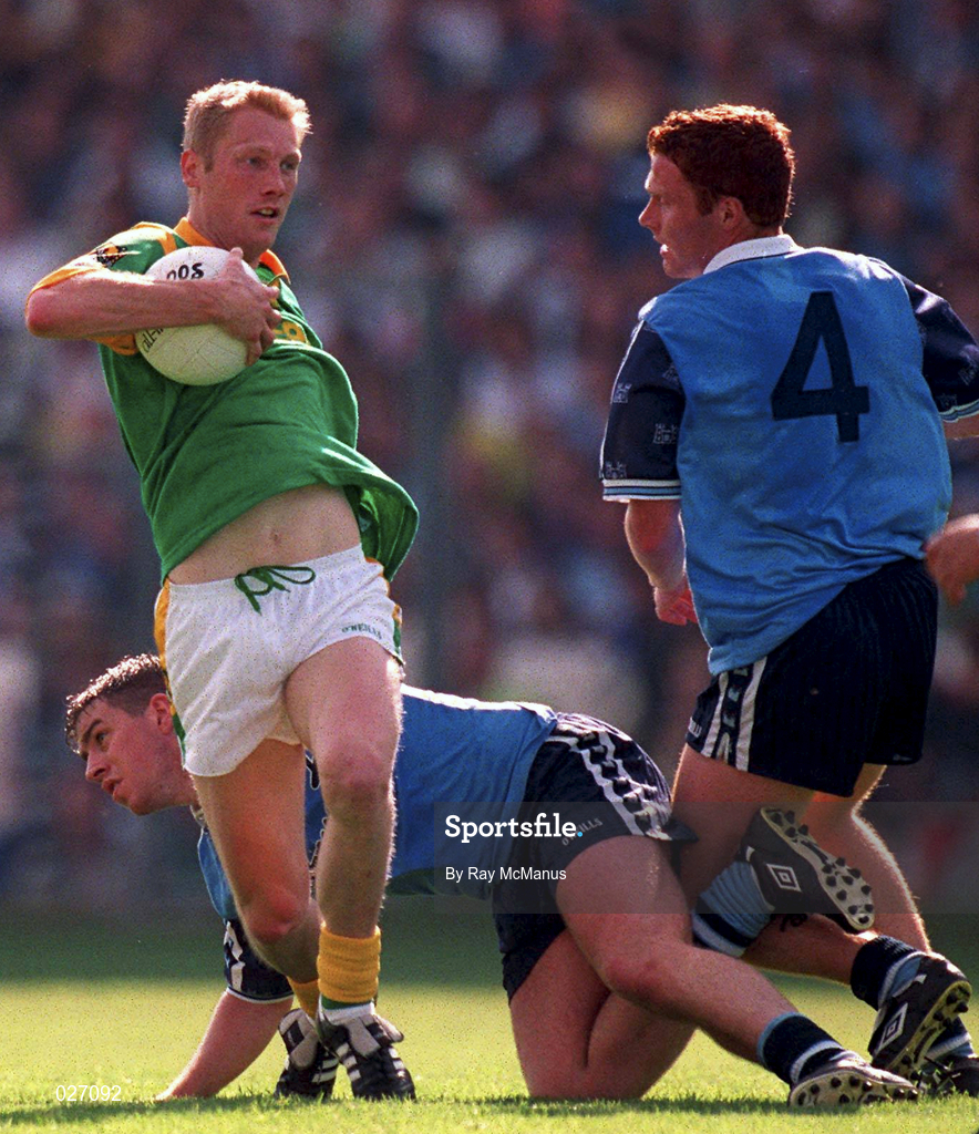 1 August 1999; Graham Geraghty of Meath in action against Jonathon McGee and Peadar Andrews, 4, of Dublin during the Bank of Ireland Leinster Senior Football Championship Final match between Dublin and Meath at Croke Park in Dublin. Photo by Ray McManus/Sportsfile