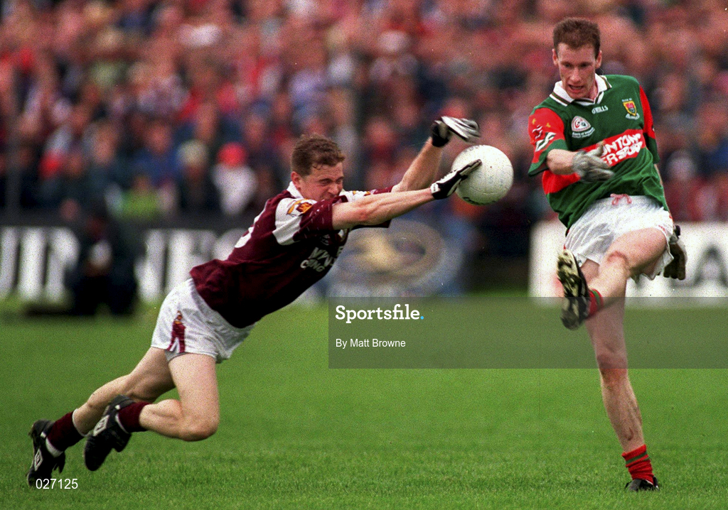 18 July 1999; James Nallen of Mayo has his shot blocked by Michael Donnellan of Galway during the Connacht Minor Football Championship Final match between Mayo and Galway at Tuam Stadium in Tuam, Galway. Photo by Matt Browne/Sportsfile