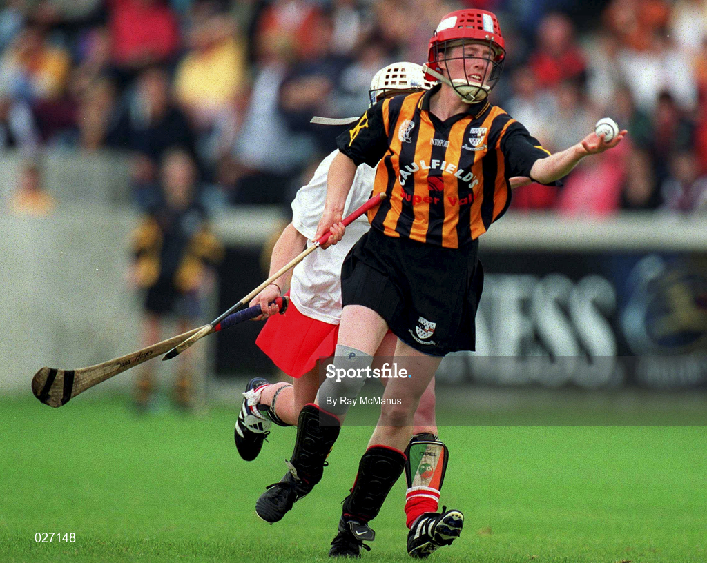 7 August 1999; Jillian Maher of Kilkenny in action against Sarah Hayes of Cork during the Bórd na Gaeilge All Ireland Senior Camogie Championship Semi-Final match between Cork and Kilkenny at Parnell Park in Dublin. Photo by Ray McManus/Sportsfile