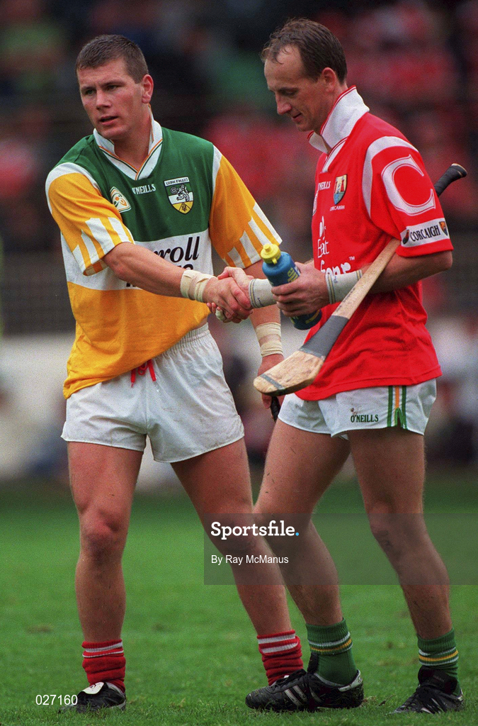 8 August 1999; Diarmuid O'Sullivan of Cork exchanges jerseys with Joe Dooley of Offaly during the Guinness All-Ireland Hurling Senior Championship Semi-Final match between Cork and Offaly at Croke Park in Dublin. Photo by Ray McManus/Sportsfile