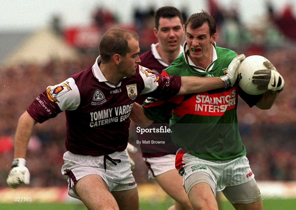 18 July 1999; John Casey of Mayo in action against Ray Silke of Galway during the Guinness Connacht Senior Football Championship Final Replay between Mayo and Galway at Tuam Stadium in Galway. Photo by Matt Browne/Sportsfile