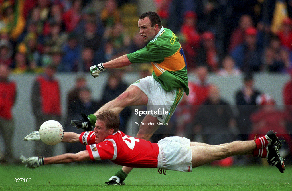 18 July 1999; Anthony Lynch of Cork attempts to blockdown the shot by John Crowley of Kerry during the Bank of Ireland Munster GAA Football Championship Final match between Cork and Kerry at Páirc Uí Chaoimh in Cork. Photo by Brendan Moran/Sportsfile