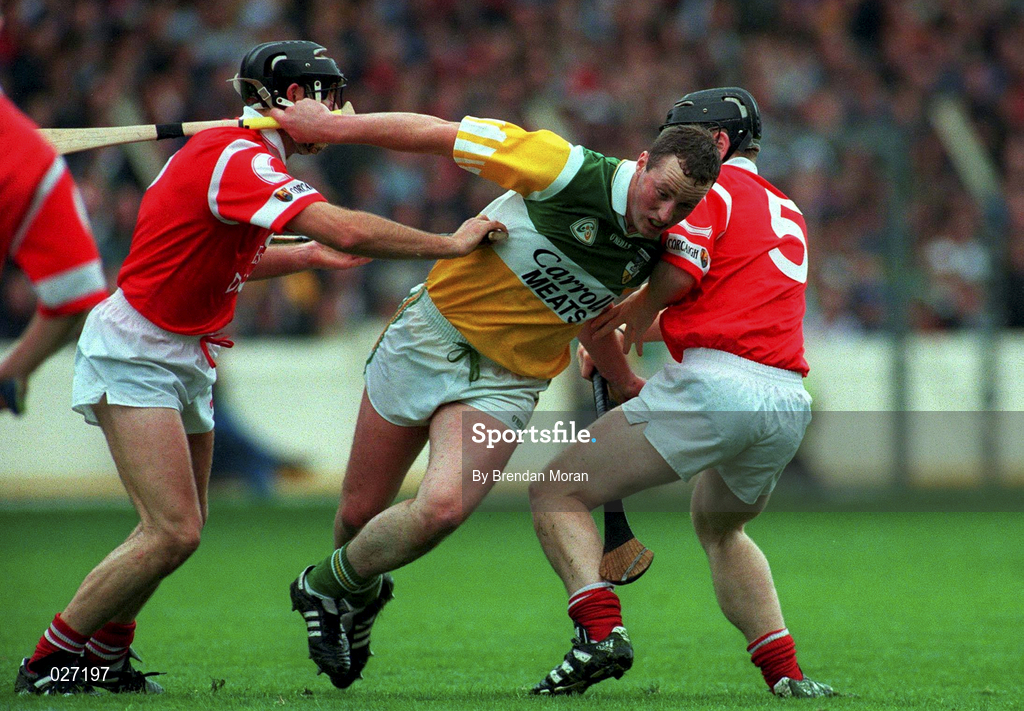 8 August 1999; John Ryan of Offaly is tackled by Brian Corcoran, left, and Wayne Sherlock of Cork during the Guinness All-Ireland Hurling Senior Championship Semi-Final match between Cork and Offaly at Croke Park in Dublin. Photo by Brendan Moran/Sportsfile