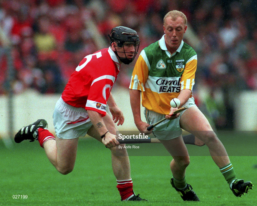 8 August 1999; John Troy of Offaly in action against Wayne Sherlock of Cork during the Guinness All-Ireland Hurling Senior Championship Semi-Final match between Cork and Offaly at Croke Park in Dublin. Photo by Aoife Rice/Sportsfile