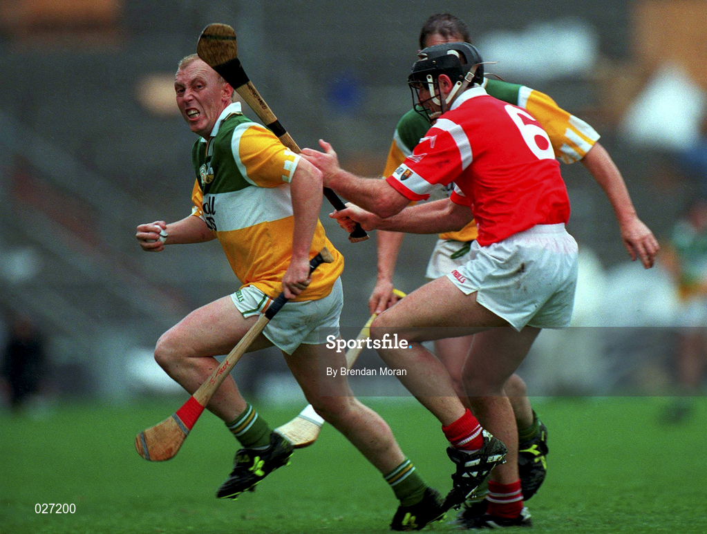 8 August 1999; John Troy of Offaly in action against Brian Corcoran of Cork during the Guinness All-Ireland Hurling Senior Championship Semi-Final match between Cork and Offaly at Croke Park in Dublin. Photo by Aoife Rice/Sportsfile