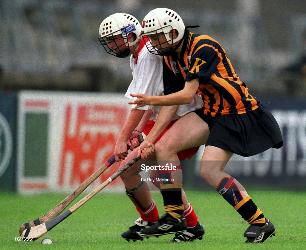 7 August 1999; Kelly Long of Kilkenny in action against Sarah Hayes of Cork during the Bórd na Gaeilge All Ireland Senior Camogie Championship Semi-Final match between Cork and Kilkenny at Parnell Park in Dublin. Photo by Ray McManus/Sportsfile