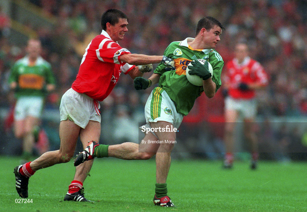 18 July 1999; Killian Burns of Kerry in action against Don Davisduring of Cork during the Bank of Ireland Munster GAA Football Championship Final match between Cork and Kerry at Páirc Uí Chaoimh in Cork. Photo by Brendan Moran/Sportsfile