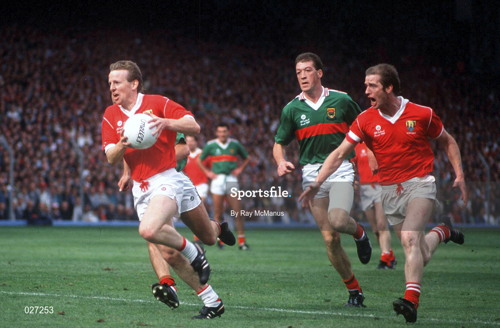 17 September 1989; John Cleary of Cork in action against TJ Kilgallon of Mayo during the All Ireland Football Championship Final match between Mayo and Cork at Croke Park in Dublin. Photo by Ray McManus/Sportsfile
