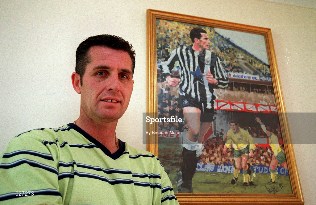 22 July 1999. Liam O'Brien pictured beside a painting of himself playing for Newcastle Utd and Norwich City at his home in Kill, Kildare. Photo by Brendan Moran/Sportsfile