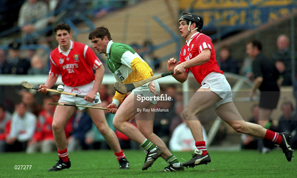 9 April 1995; Michael Duignan of Offaly in action against Alan Browne of Cork during the Church & General National Hurling League Quarter Final match between Offaly and Cork at Semple Stadium in Thurles, Tipperary. Photo by Ray McManus/Sportsfile