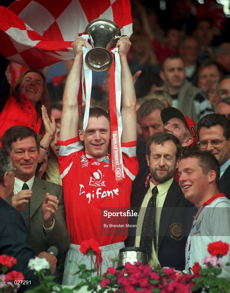 18 July 1999; Cork captain Philip Clifford lifts the cup after his side defeated Kerry during the Bank of Ireland Munster GAA Football Championship Final match between Cork and Kerry at Páirc Uí Chaoimh in Cork. Photo by Brendan Moran/Sportsfile