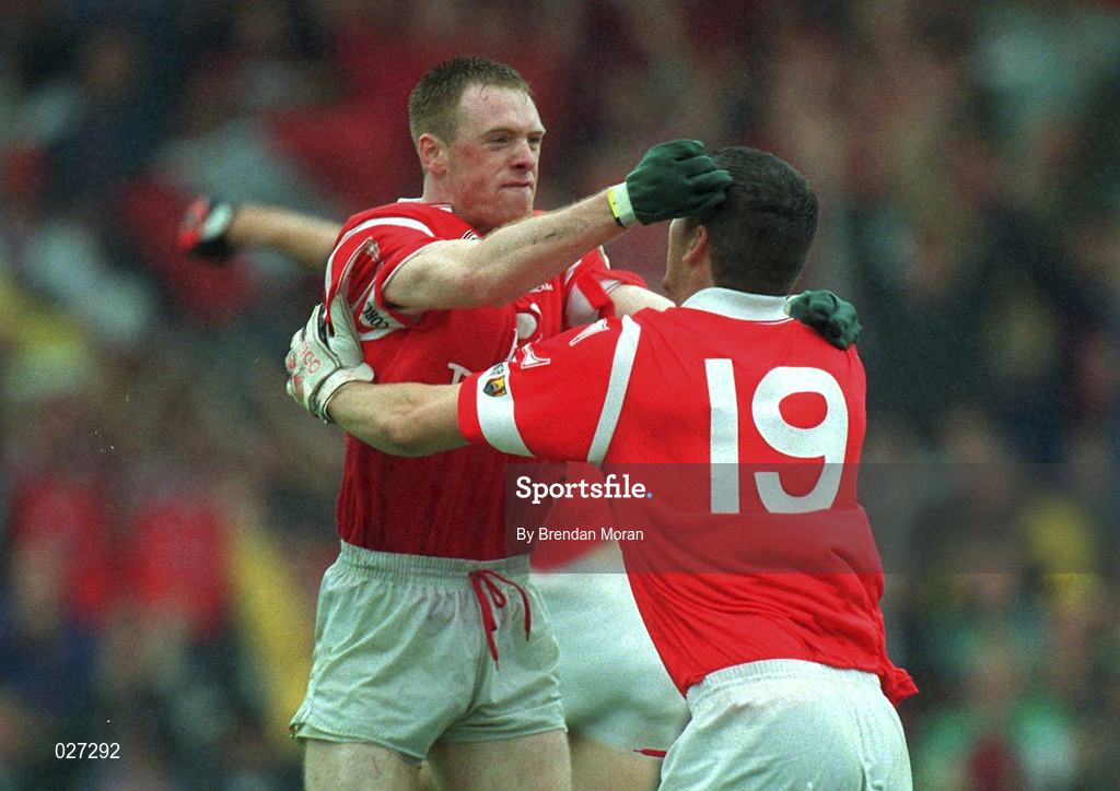18 July 1999; Philip Clifford of Cork congratulates his team-mate Fachtna Collins after scoring his side's first goal during the Bank of Ireland Munster GAA Football Championship Final match between Cork and Kerry at Páirc Uí Chaoimh in Cork. Photo by Brendan Moran/Sportsfile