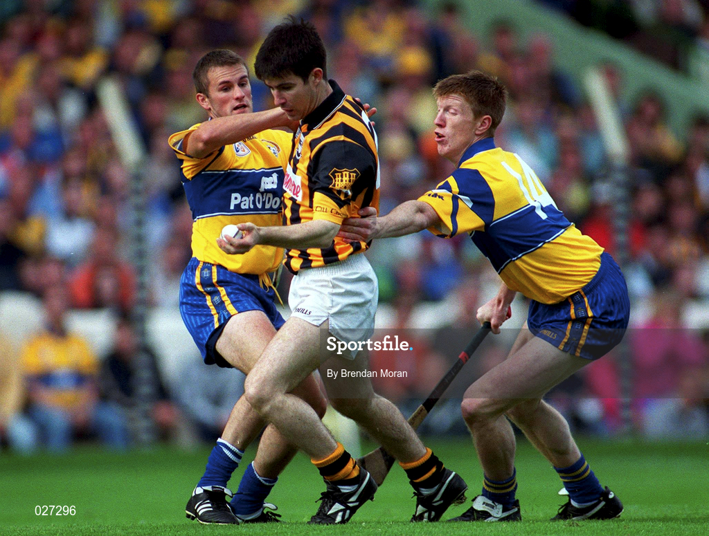 15 August 1999; Philip Larkin of Kilkenny in action against Alan Markham, left, and Niall Gilligan of Clare during the Guinness All-Ireland Senior Hurling Championship Semi-Final match between Kilkenny and Clare at Croke Park in Dublin. Photo by Brendan Moran/Sportsfile