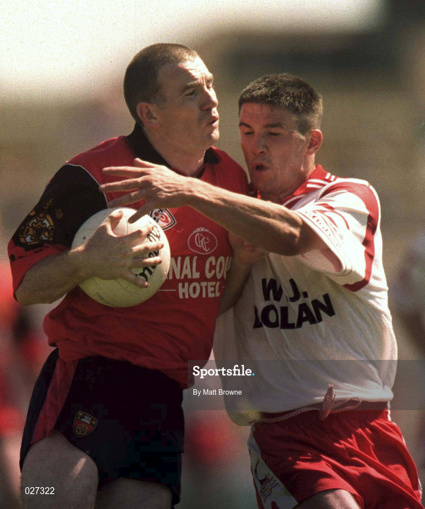 11 July 1999; Ross Carr of Down in action against Ciaran Gourley of Tyrone during the Bank of Ireland Ulster Football Championship Semi Final match between Down and Tyrone at Casement Park in Belfast, Antrim. Photo by Matt Browne/Sportsfile