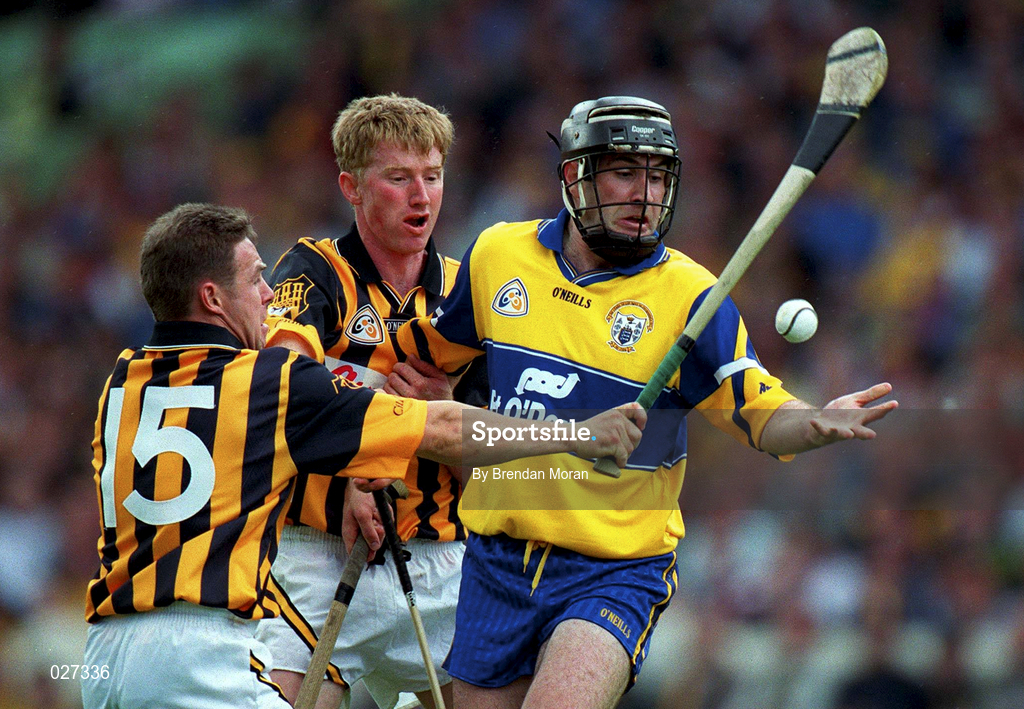 15 August 1999; Sean McMahon of Clare is tackled by Charlie Carter, 15, and John Power of Kilkenny during the Guinness All-Ireland Senior Hurling Championship Semi-Final match between Kilkenny and Clare at Croke Park in Dublin. Photo by Brendan Moran/Sportsfile