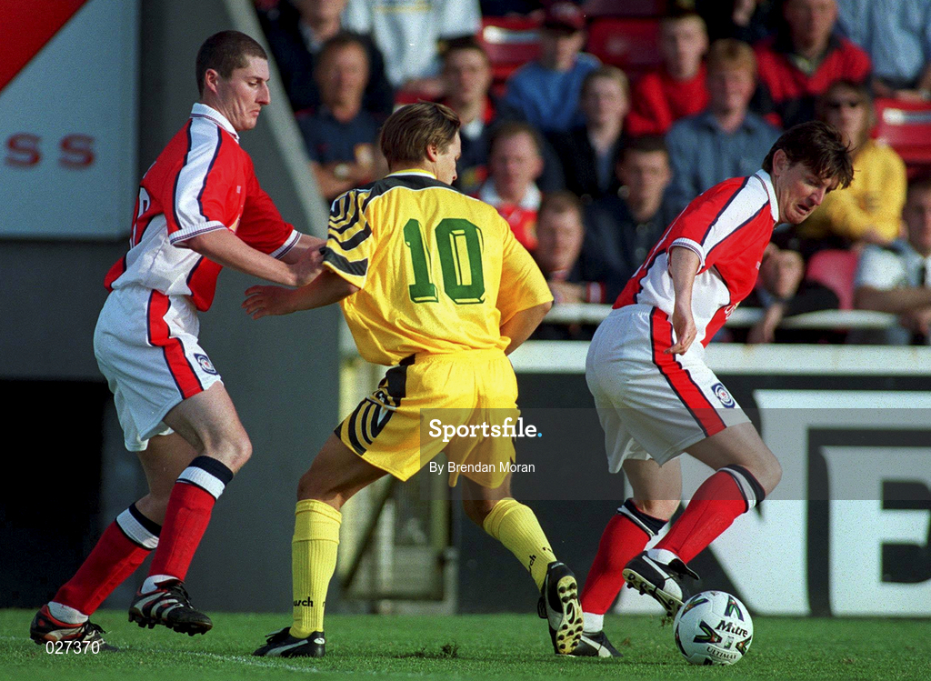 14 July 1999; Colin Hawkins, left, and Martin Russell of St Patricks Athletic in action against Serghei Iepureanu of FSC Zimbru during the UEFA Champions League Qualifying match between St Patricks Athletic and FSC Zimbru at Richmond Park in Dublin. Photo by Brendan Moran/Sportsfile