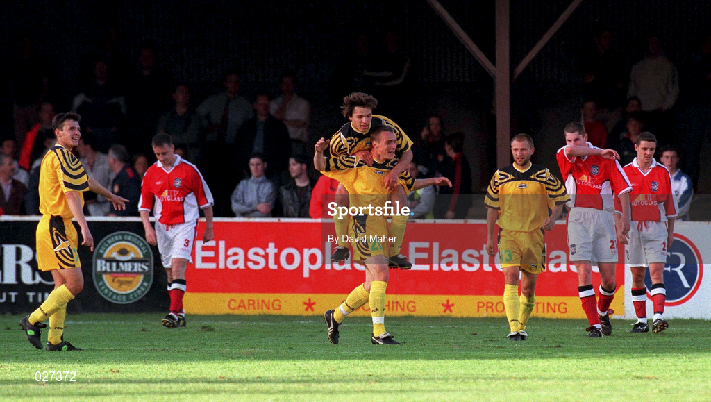 14 July 1999; Serghei Iepureanu of FSC Zimbru celebrates with team-mate Victor Berco on scoring their sides third goal during the UEFA Champions League Qualifying match between St Patricks Athletic and FSC Zimbru at Richmond Park in Dublin. Photo by David Maher/Sportsfile
