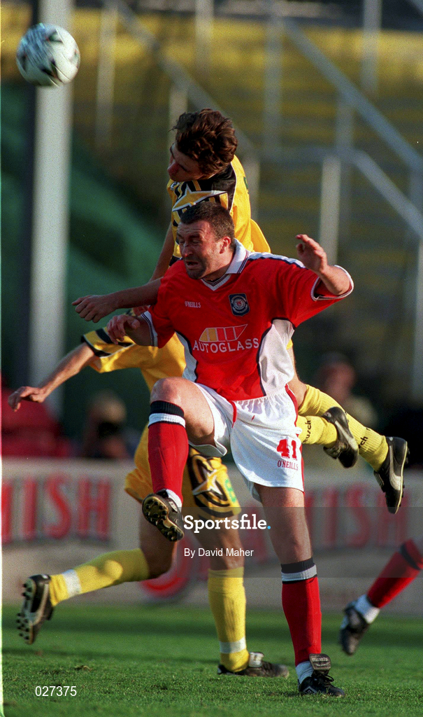 14 July 1999;  Ian Gilzean of St Patrick's Athletic in action against Valeriu Catinsusu of FSC Zimbru during the UEFA Champions League Qualifying match between St Patricks Athletic and FSC Zimbru at Richmond Park in Dublin. Photo by David Maher/Sportsfile
