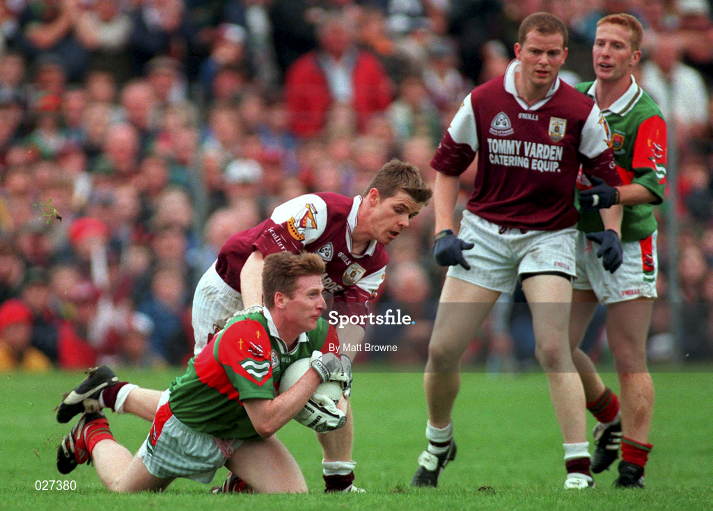 18 July 1999; Kevin Cahill of Mayo in action against Niall Finnegan of Galway during the Guinness Connacht Senior Football Championship Final Replay between Mayo and Galway at Tuam Stadium in Galway. Photo by Matt Browne/Sportsfile