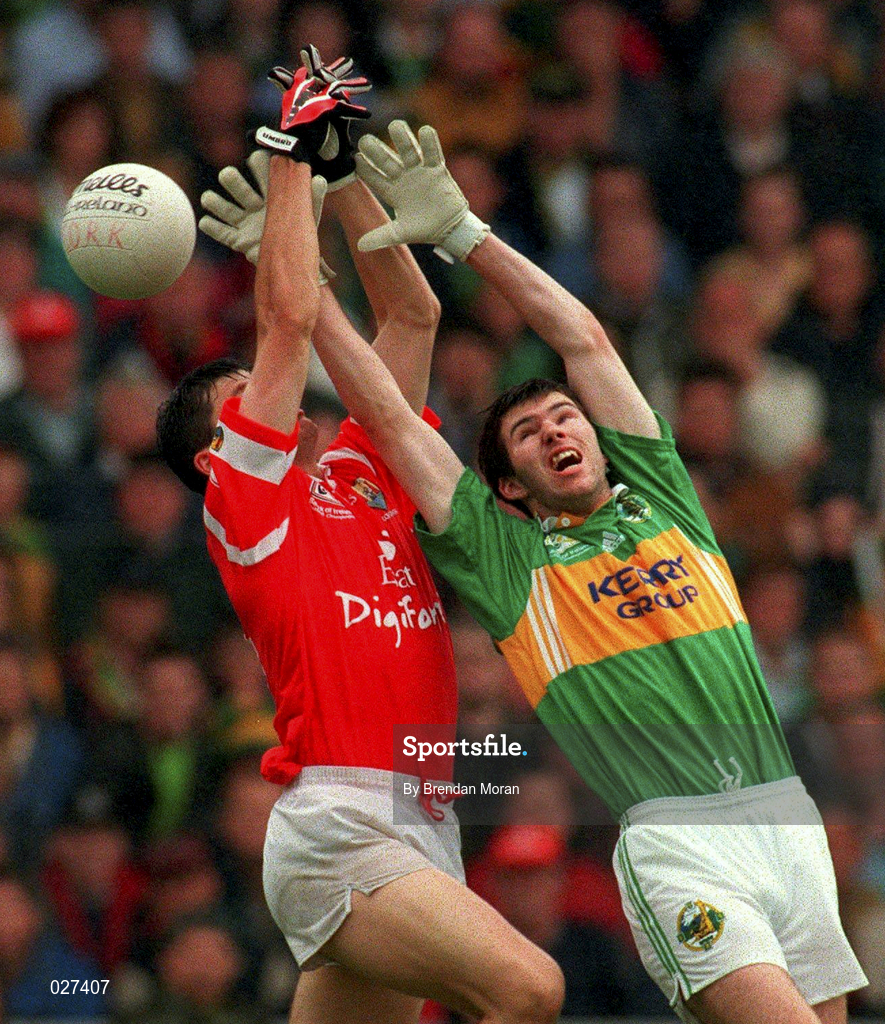 18 July 1999; Michael McCarthy of Kerry in action against Mark O'Sullivan of Cork during the Bank of Ireland Munster GAA Football Championship Final match between Cork and Kerry at Páirc Uí Chaoimh in Cork. Photo by Brendan Moran/Sportsfile