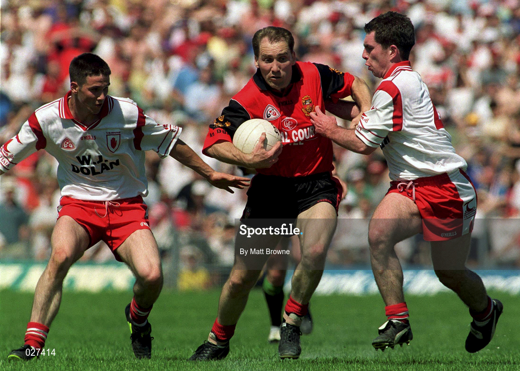 11 July 1999; Mickey Linden of Down in action against Paul McGurk, right, and Ciaran Gourley of Tyrone during the Bank of Ireland Ulster Football Championship Semi Final match between Down and Tyrone at Casement Park in Belfast, Antrim. Photo by Matt Browne/Sportsfile