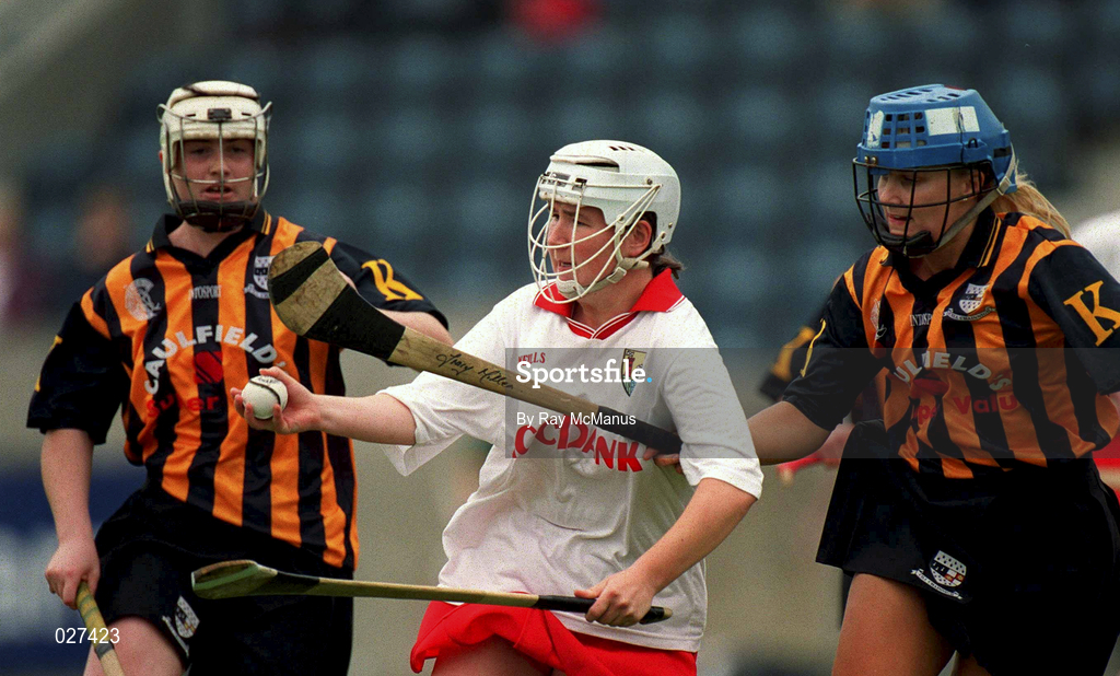 7 August 1999; Miriam Deasy of Cork in action against  Tracey Millea of Kilkenny during the Bórd na Gaeilge All Ireland Senior Camogie Championship Semi-Final match between Cork and Kilkenny at Parnell Park in Dublin. Photo by Ray McManus/Sportsfile