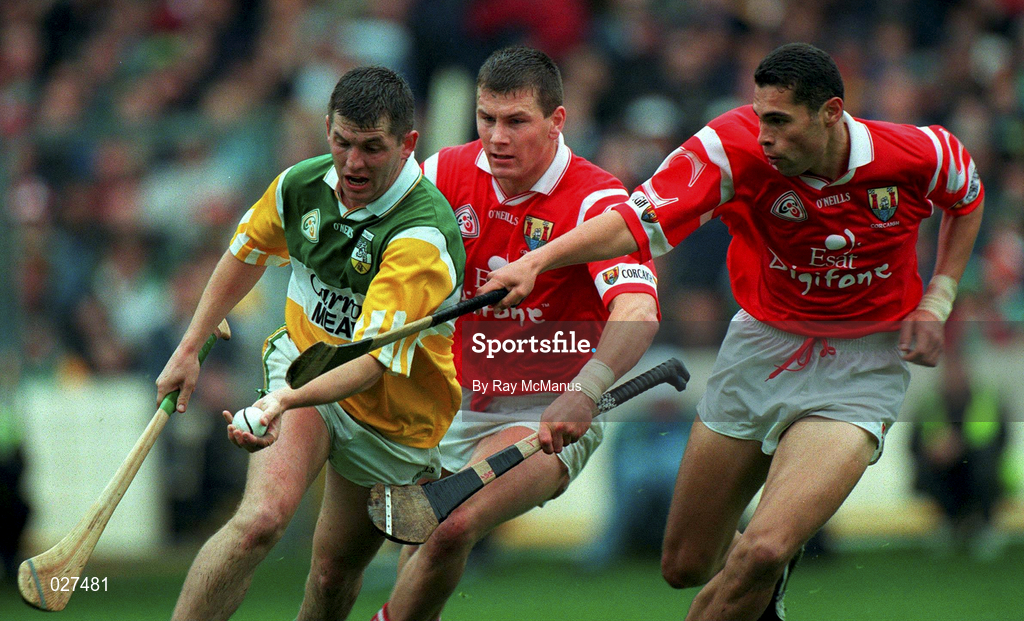 8 August 1999; Paudie Mulhare of Offaly is tackled by Diarmaid O'Sullivan, centre, and Sean Og O'hAilpin of Cork during the Guinness All-Ireland Hurling Senior Championship Semi-Final match between Cork and Offaly at Croke Park in Dublin. Photo by Ray McManus/Sportsfile