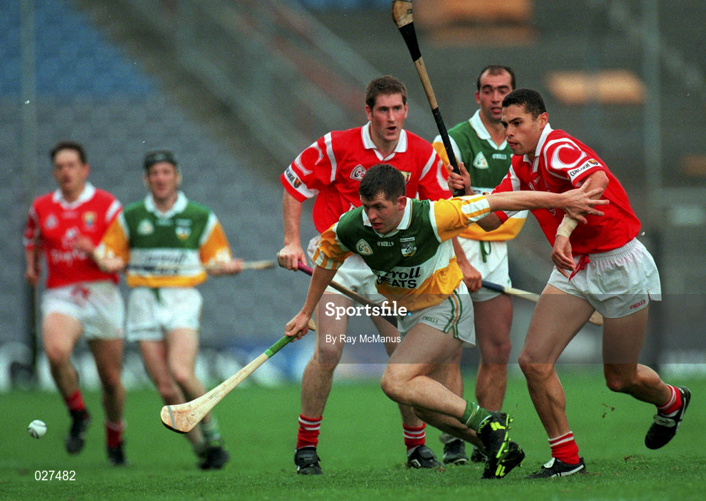 8 August 1999; Paudie Mulhare of Offaly in action against Sean Og O'hAilpin of Cork during the Guinness All-Ireland Hurling Senior Championship Semi-Final match between Cork and Offaly at Croke Park in Dublin. Photo by Ray McManus/Sportsfile