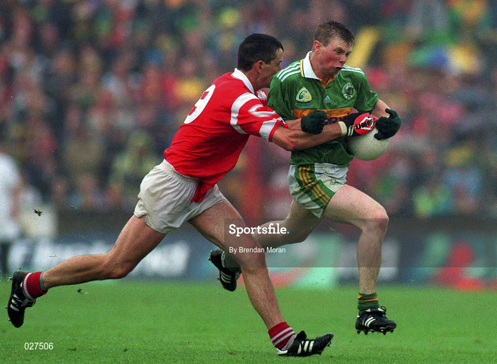 18 July 1999; Tomás O'Sé of Kerry in action against Michael O'Sullivan of Cork during the Munster GAA Football  Championship Final match between Cork and Kerry at Páirc Uí Chaoimh in Cork. Photo by Brendan Moran/Sportsfile