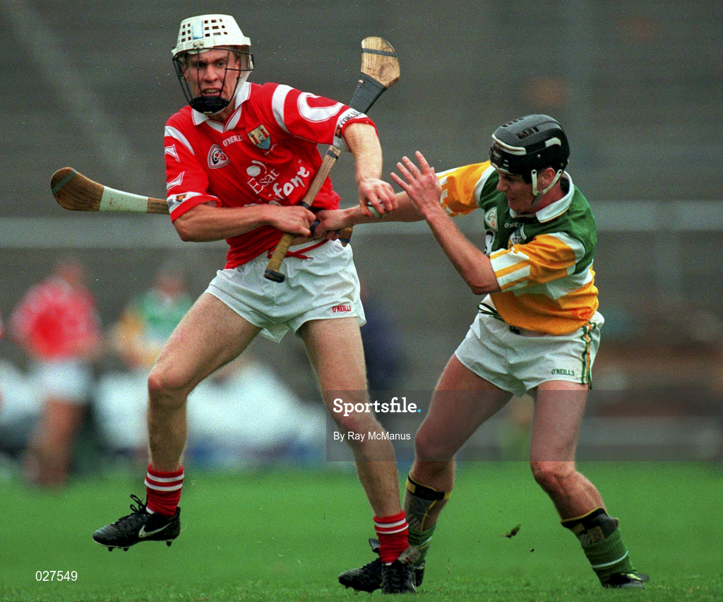 8 August 1999; Timmy McCarthy of Cork in action against  Hubert Rigney of Offaly during the Guinness All-Ireland Hurling Senior Championship Semi-Final match between Cork and Offaly at Croke Park in Dublin. Photo by Ray McManus/Sportsfile