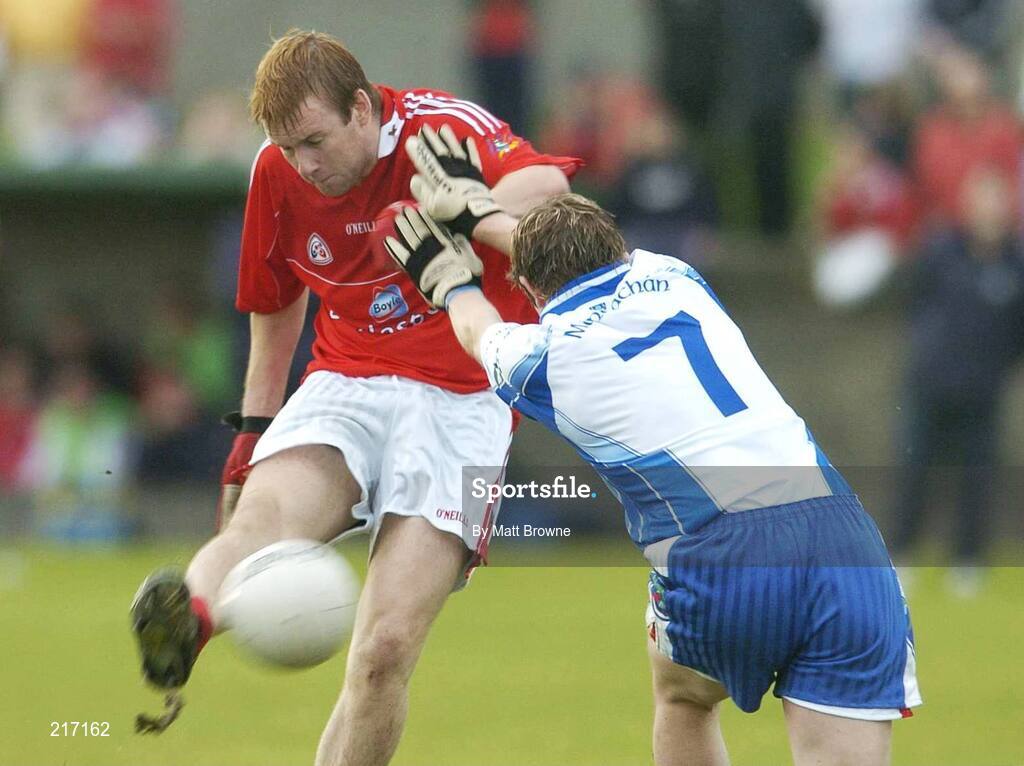 4 August 2006; Mick Fanning, Louth, in action against Darren Hughes, Monaghan. Tommy Murphy Cup Quarter-Final, Louth v Monaghan, St. Brigid's Park, Dowdallshill, Dundalk, Co. Louth. Picture credit; Matt Browne / SPORTSFILE