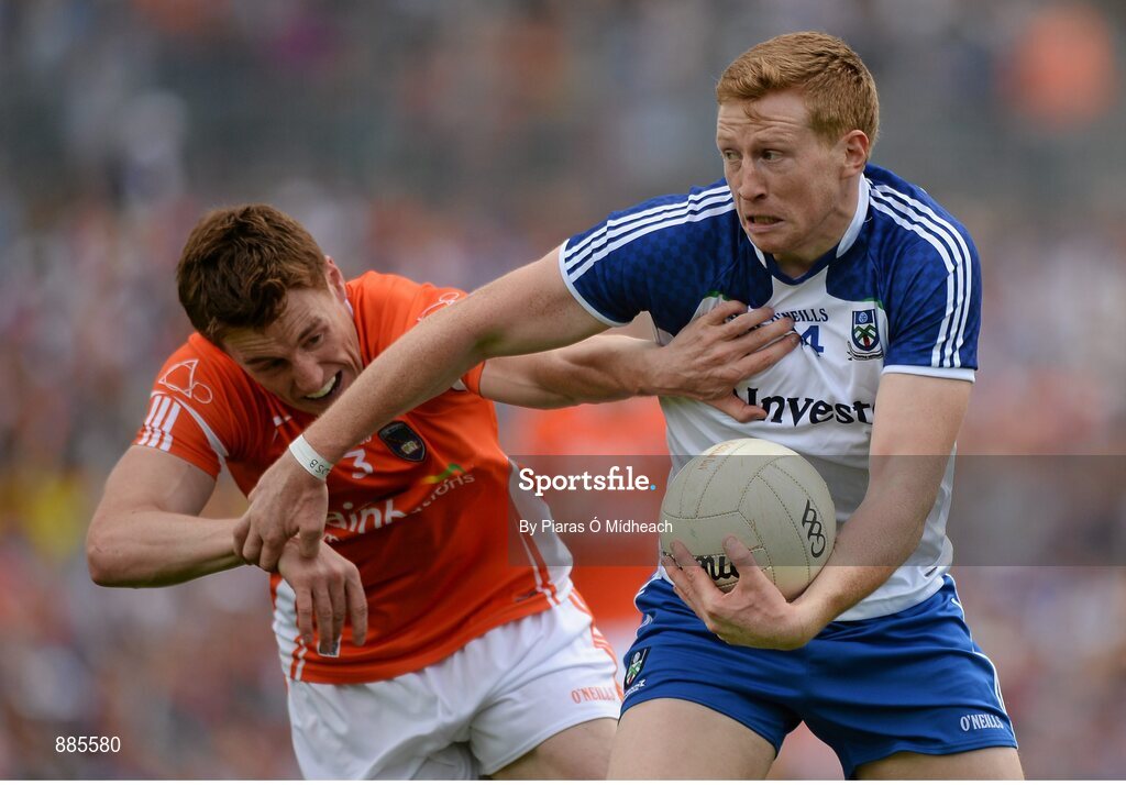 6 July 2014; Kieran Hughes, Monaghan, in action against Charlie Vernon, Armagh. Ulster GAA Football Senior Championship, Semi-Final Replay, Armagh v Monaghan, St Tiernach's Park, Clones, Co. Monaghan. Picture credit: Piaras Ó Mídheach / SPORTSFILE