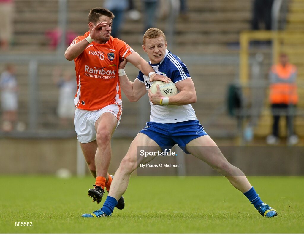 6 July 2014; Colin Walshe, Monaghan, in action against Eugene McVerry, Armagh. Ulster GAA Football Senior Championship, Semi-Final Replay, Armagh v Monaghan, St Tiernach's Park, Clones, Co. Monaghan. Picture credit: Piaras Ó Mídheach / SPORTSFILE
