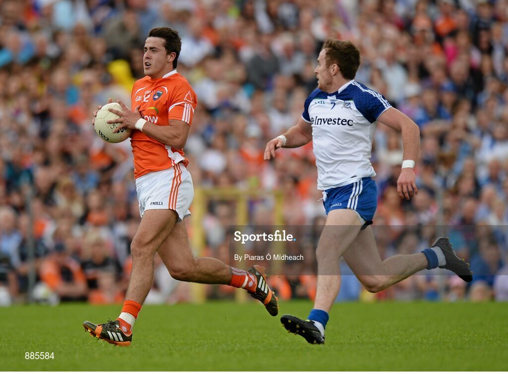 6 July 2014; Stefan Campbell, Armagh, in action against Fintan Kelly, Monaghan. Ulster GAA Football Senior Championship, Semi-Final Replay, Armagh v Monaghan, St Tiernach's Park, Clones, Co. Monaghan. Picture credit: Piaras Ó Mídheach / SPORTSFILE