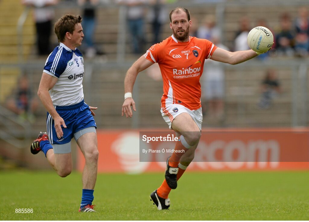 6 July 2014; Ciaran McKeever, Armagh, in action against Dessie Mone, Monaghan. Ulster GAA Football Senior Championship, Semi-Final Replay, Armagh v Monaghan, St Tiernach's Park, Clones, Co. Monaghan. Picture credit: Piaras Ó Mídheach / SPORTSFILE