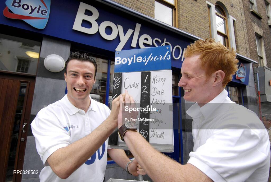10 August 2006; Boylesports, Ireland's largest independent bookmaker, today celebrated opening the doors to the company's 100th shop on Dublin's Capel Street. At the opening are Dublin footballer Ray Cosgrove, left, and Laois footballer Padraig Clancy. Capel Street, Dublin. Picture credit; Ray McManus / SPORTSFILE