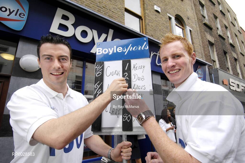 10 August 2006; Boylesports, Ireland's largest independent bookmaker, today celebrated opening the doors to the company's 100th shop on Dublin's Capel Street. At the opening are Dublin footballer Ray Cosgrove, left, and Laois footballer Padraig Clancy. Capel Street, Dublin. Picture credit; Ray McManus / SPORTSFILE
