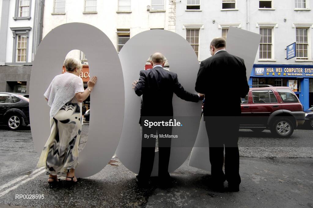 10 August 2006; Behind the scenes, Boylesports, Ireland's largest independent bookmaker, today celebrated opening the doors to the company's 100th shop on Dublin's Capel Street. Manging Director and Founder of Boylesports John Boyle with the longest serving staff members Doreen Hanley, left, and Frank Cruise, right, stand behind the numbers 100 for a photograph. Capel Street, Dublin. Picture credit; Ray McManus / SPORTSFILE