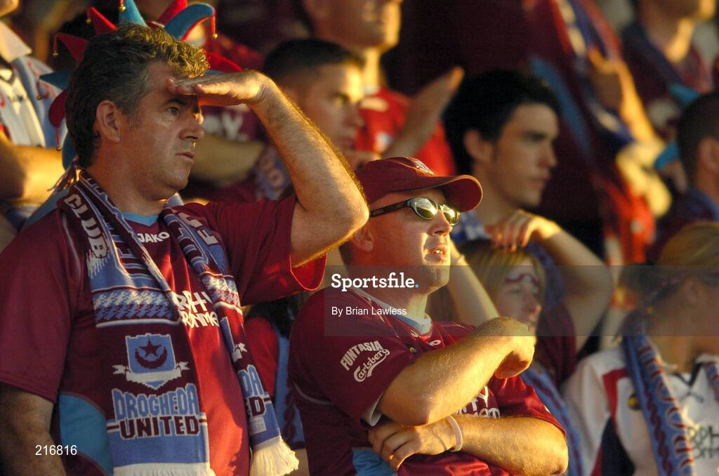27 July 2006; Drogheda United fans shield their eyes from the sun. UEFA Cup 1st Round, 2nd Leg, Drogheda United v HJK Helsinki, Dalymount Park, Dublin. Picture credit; Brian Lawless / SPORTSFILE