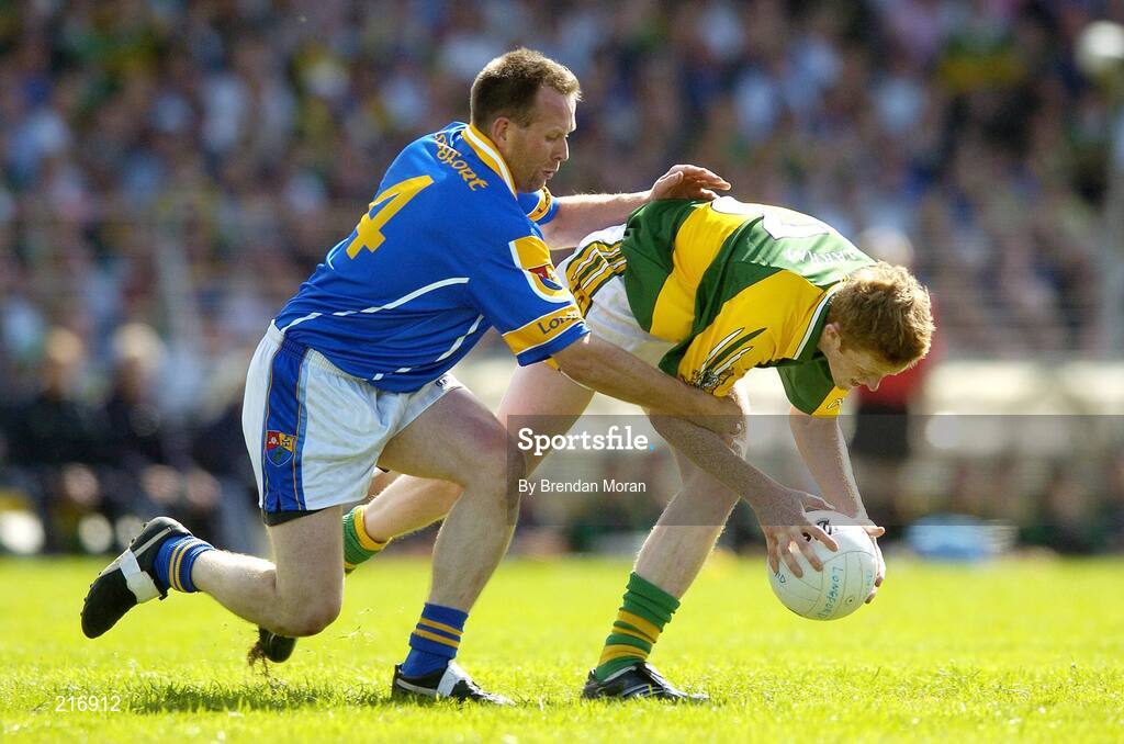 29 July 2006; Colm Cooper, Kerry, in action against Cathal Conefrey, Longford. Bank of Ireland All-Ireland Senior Football Championship Qualifier, Round 4, Kerry v Longford, Fitzgerald Stadium, Killarney, Co. Kerry. Picture credit; Brendan Moran / SPORTSFILE