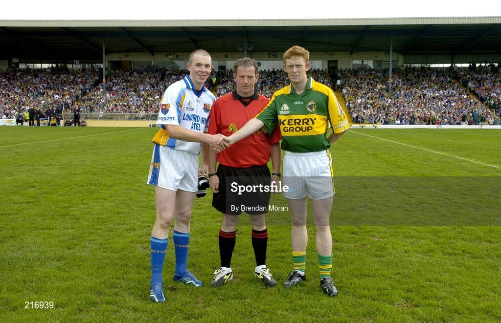 29 July 2006; Kerry captain Colm Cooper shakes hands with Longford captain Damien Sheridan, in the company of referee Vincent Neary, before the game. Bank of Ireland All-Ireland Senior Football Championship Qualifier, Round 4, Kerry v Longford, Fitzgerald Stadium, Killarney, Co. Kerry. Picture credit; Brendan Moran / SPORTSFILE