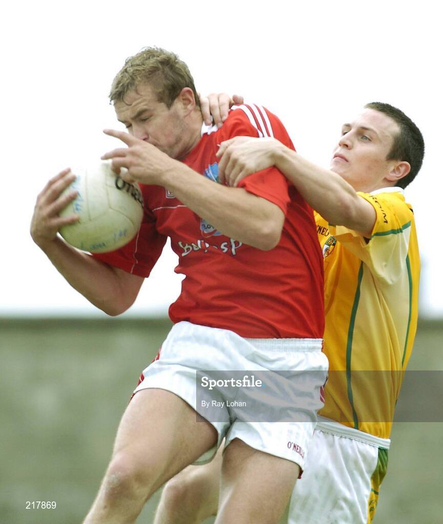 12 August 2006; Paddy Keenan, Louth, in action against Michael McCann, Antrim. Tommy Murphy Cup, Semi-Final, Louth v Antrim, St. Brigid's Park, Dowdallshill, Dundalk, Co. Louth. Picture credit; Ray Lohan / SPORTSFILE