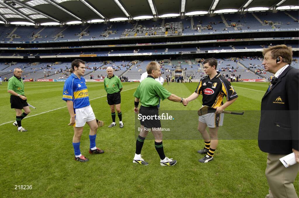 13 August 2006; Tipperary captain Joey McLoughney waits as referee Ger Hoey, Clare, greets the Kilkenny captain Colin McGrath. All-Ireland Minor Hurling Championship, Semi-Final, Kilkenny v Tipperary, Croke Park, Dublin. Picture credit; Ray McManus / SPORTSFILE