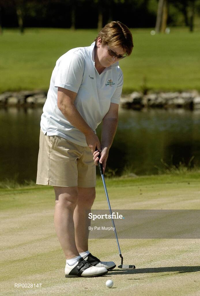 17 July 2006; Mary Arthur, Dromoland Golf Club, Clare and Munster putts on the 18th green. AIB Christy O'Connor Jnr Challenge Final, Leinster v Munster, The K Club, Straffan, Co. Kildare. Picture credit: Pat Murphy / SPORTSFILE