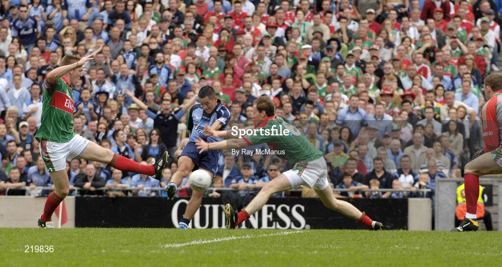 27 August 2006; Jason Sherlock, Dublin, beats Mayo players David Heaney, left, James Nallen and goalkeeper David Clarke only to hit the crossbar. Bank of Ireland All-Ireland Senior Football Championship Semi-Final, Dublin v Mayo, Croke Park, Dublin. Picture credit; Ray McManus / SPORTSFILE