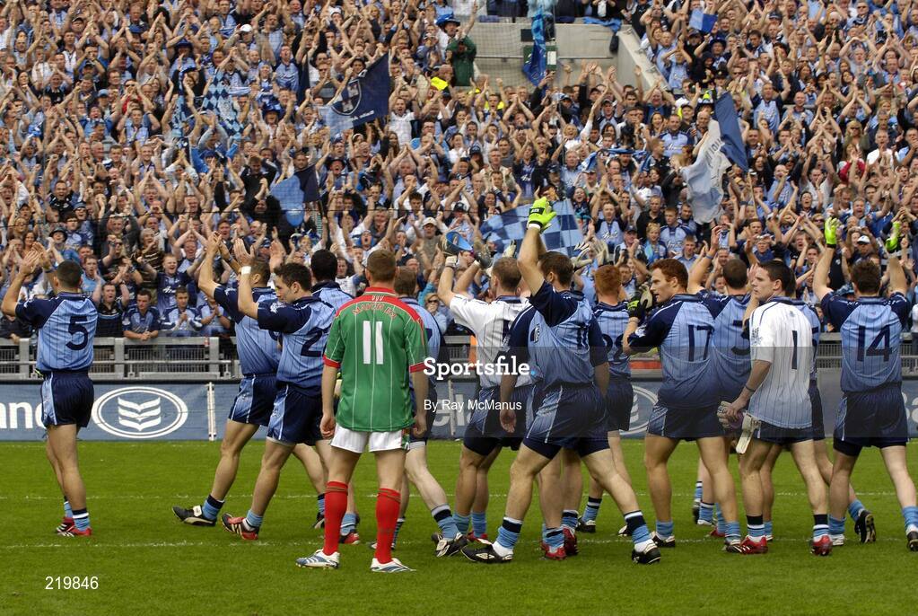 27 August 2006; Ger Brady, 11, Mayo, looks on as the Dublin players salute the Dublin fans in Hill 16 before the game. Bank of Ireland All-Ireland Senior Football Championship Semi-Final, Dublin v Mayo, Croke Park, Dublin. Picture credit; Ray McManus / SPORTSFILE