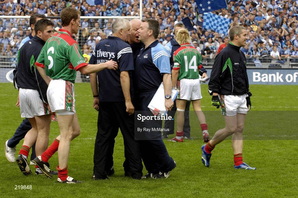 27 August 2006; Ray Boyne, Dublin, stands up to Mayo manager Mickey Moran before the start of the game. Bank of Ireland All-Ireland Senior Football Championship Semi-Final, Dublin v Mayo, Croke Park, Dublin. Picture credit; Ray McManus / SPORTSFILE