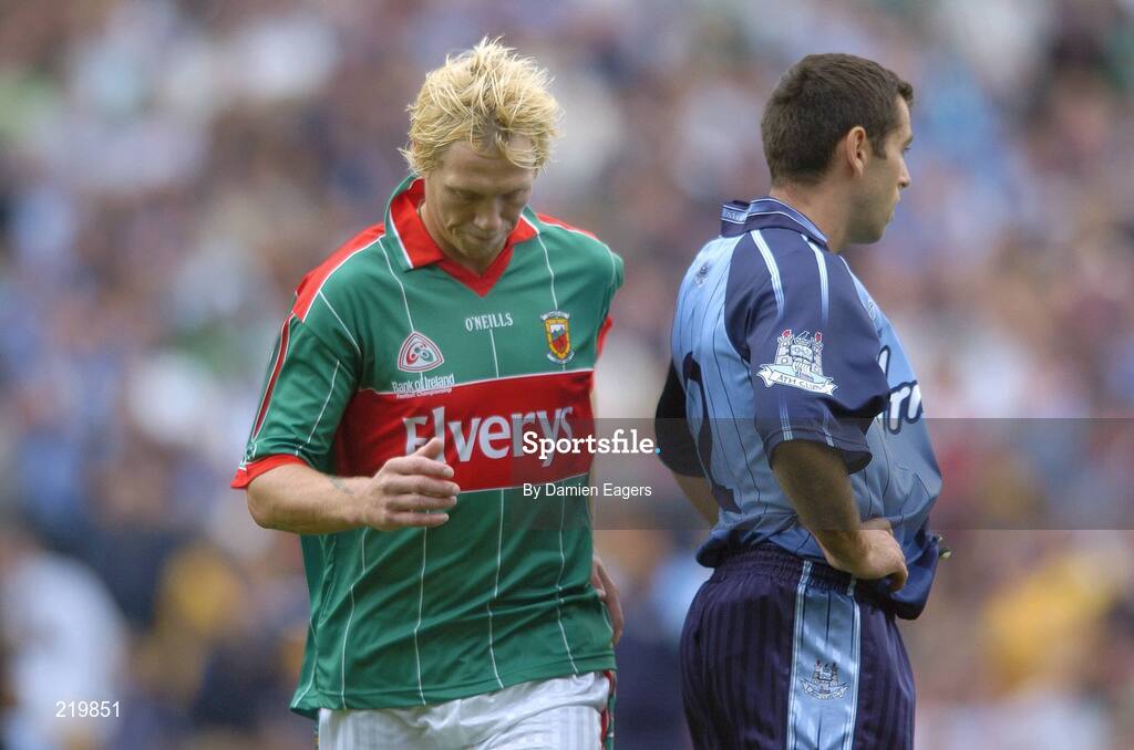 27 August 2006; Ciaran McDonald, Mayo, runs past Dublin's David Henry as they both warm up at the Hill 16 end. Bank of Ireland All-Ireland Senior Football Championship Semi-Final, Dublin v Mayo, Croke Park, Dublin. Picture credit; Damien Eagers / SPORTSFILE